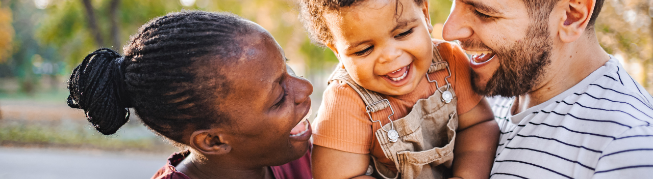 Black women, Black Child, Black man smiling